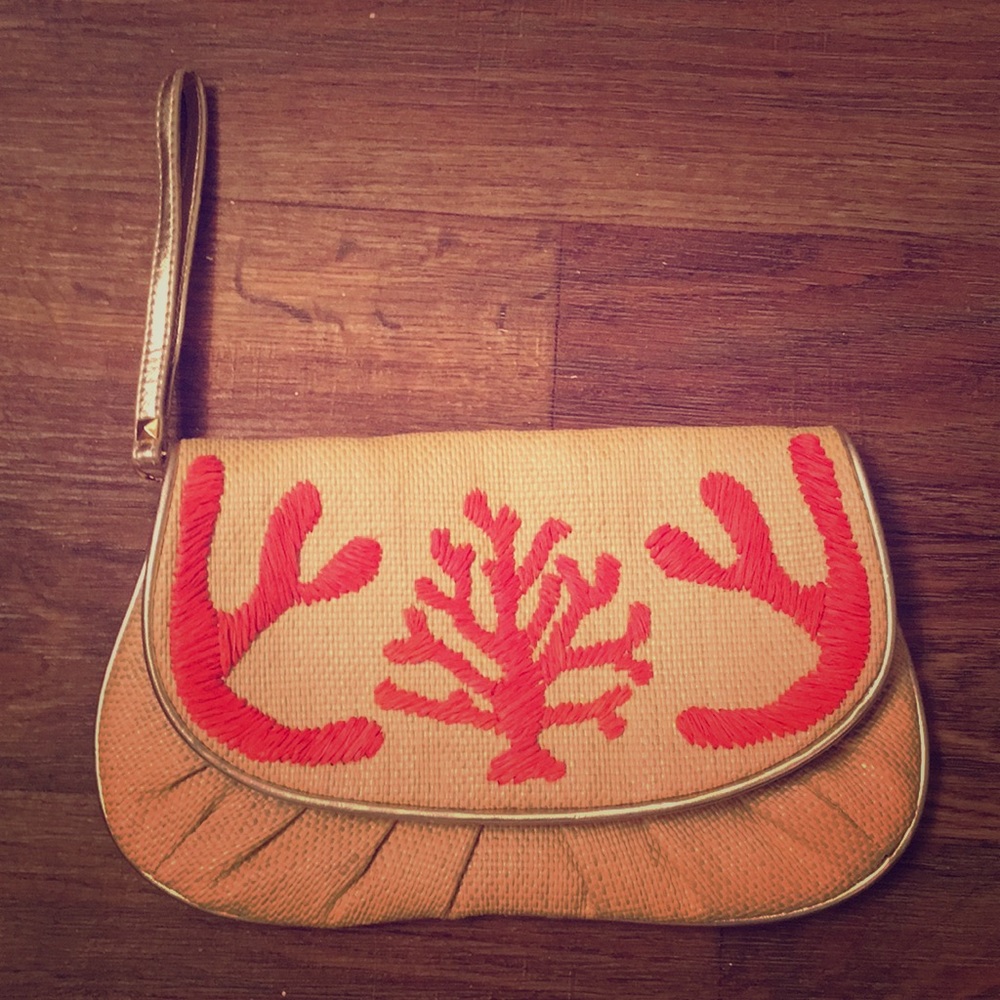Like New, Coral and tan wristlet